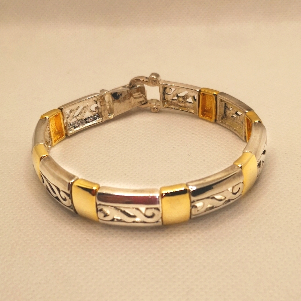 Gold and silver tone link bracelet